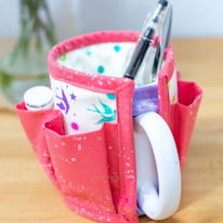 photo d'un mug portant une housse avec de nombreuses poches