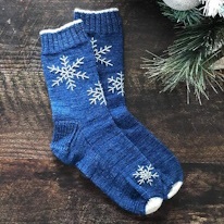 photo d'une paire de chaussettes à motifs flocons de neige