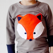 photo d'un pyjama pour enfant avec un appliqué renard