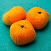 photo de trois mandarines en feutrine