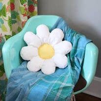 photo d'un coussin en forme de marguerite