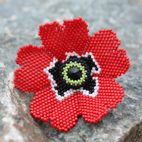 photo d'un coquelicot en perles de rocaille
