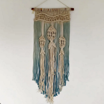 photo d'une déco murale en macramé représentant des poissons