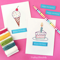 photo de deux cartes brodées