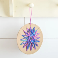 photo d'un ornement en papier et laine